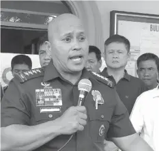  ??  ?? PNP chief Ronald "Bato" dela Rosa expressed disappoint­ment as to how Maasin policemen reacted when their station in Maasin, Iloilo was attacked by New People's Army on June 18. Dela Rosa was in Iloilo yesterday, and visited Police Regional Office 6...
