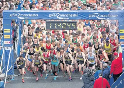  ??  ?? ●●The start of the men’s race at last year’s Great Manchester Run