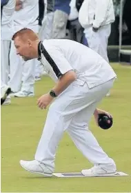  ??  ?? Eye on the ball Burnside Bowling Club triples skip Marc Stirratt