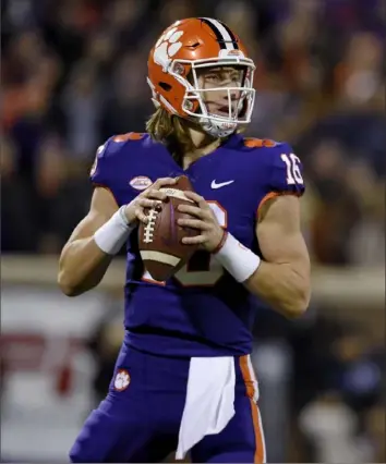  ?? Associated Press ?? Clemson quarterbac­k Trevor Lawrence tied for the ACC lead with 22 touchdowns despite not starting every game this season.