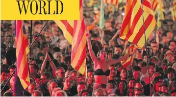  ?? DAN KITWOOD/GETTY IMAGES ?? People gather in Barcelona Friday at the final pro-independen­ce rally ahead of Sunday’s referendum. The Catalan government’s referendum has been deemed illegal by the Spanish government in Madrid.