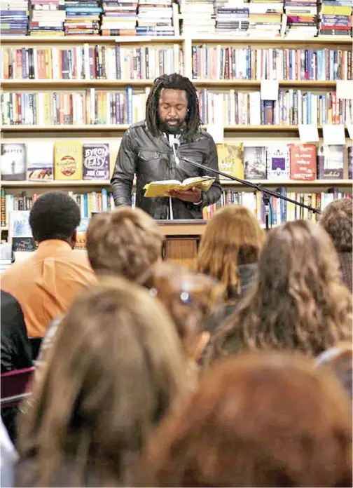  ?? Tribune News Service ?? St.paul writer Marlon James reads from ‘A Brief History of Seven Killings’ at Next Chapter Bookseller­s.