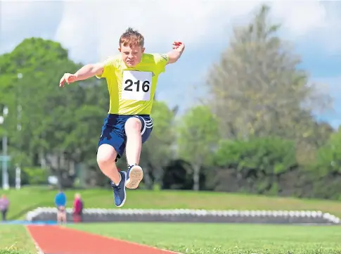  ?? All pictures by Gareth Jennings. ?? ON YOUR MARKS: Disabled athletes of all ages took part in a variety of events in the Tayside Track And Field Championsh­ips in Dundee.