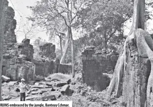  ??  ?? ruins embraced by the jungle, Banteay Cchmar.