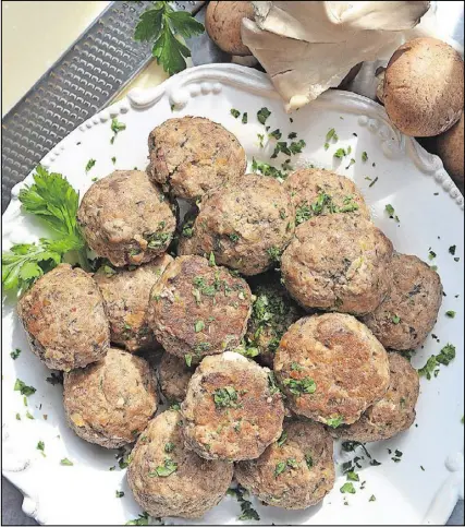  ?? PHOTO BY CHRIS HUNT / SPECIAL ?? Pictured are Craig Richards’ Tuscan-Inspired Mushroom Meatballs. Richards, the executive chef at St. Cecilia in Buckhead, gave us this recipe for meatballs made with ground pork, ground beef and mushrooms. His top choice for shrooms is porcinis, but...