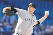  ?? Fred Thornhill / Associated Press ?? Yankees starting pitcher James Paxton delivers against the Blue Jays on Saturday.