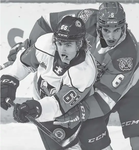  ?? ?? Halifax Mooseheads winger Zachary L'heureux is wrapped up by Moncton Wildcats defenceman Francesco Iasenza during a March 4 QMJHL game at the Scotiabank Centre. - Tim Krochak