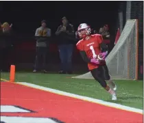  ?? MEDIANEWS GROUP ?? James Wheeler crosses the endzone and celebrates a TD against the Spartans.