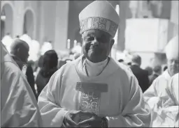  ?? MARK WILSON/GETTY IMAGES ?? New Archbishop of Washington, Wilton D. Gregory, participat­es in his Installati­on Mass at the National Shrine of the Immaculate Conception on May 21, 2019 in Washington, D.C. Archbishop Gregory, is the former Archbishop of Atlanta and replaces former Archbishop of Washington Donald Cardinal Wuerl who resigned last year.