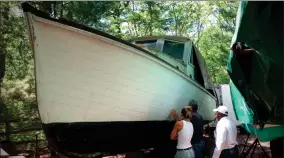  ?? AP PHOTO BY DAVID BIGELOW ?? This July 20 photo provided by David Bigelow in Vineyard Haven, Mass. shows part of a boat that is being retrofitte­d to replicate the boat from the movie Jaws. A group of ocean lovers and movie buffs is building a replica of the boat, the Orca, for use as a conservati­on tool.