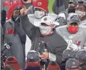  ?? GETTY IMAGES ?? Bucs coach Bruce Arians celebrates with his team which won its third playoff game on the road.