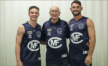  ?? ?? Across generation­s: Mooroopna’s Coby James and Chris Nield meet past player Kevin Holden during the week to unveil the club’s new heritage guernsey.
