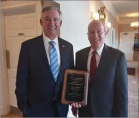  ?? GARY PULEO - DIGITAL FIRST MEDIA ?? Montgomery County District Attorney Kevin Steele, left, with Montgomery Bar Foundation President Carl Weiner. Steele received The Honorable Louis D. Stefan Law Enforcemen­t Award at Montgomery Bar Associatio­n’s luncheon on Friday.