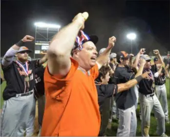  ?? PETE BANNAN – DIGITAL FIRST MEDIA ?? As head coach, Mark Jordan was leading the cheers last year when his Marple Newtown team celebrated a 2-1 win in 10 innings in the PIAA Class 5A championsh­ip game at Penn State.