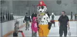  ?? ?? Sparky the Fire Dog mascot attended the public skating event at the Fairview East Arena, Feb.