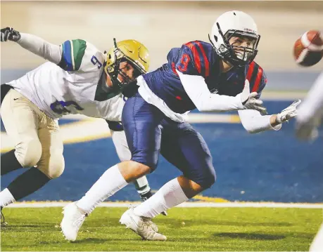  ?? DAN JANISSE ?? Nick Brajkovic, right, a graduate of Holy Names, brings versatilit­y to St. Clair. He can line up at defensive end, linebacker and tight end.