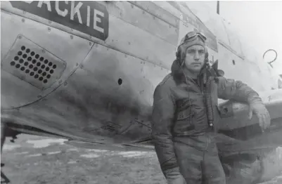  ??  ?? Maj. James J. England was the commanding officer of 530th Squadron while in China. He was also the top scoring pilot in the outfit with 10 confirmed kills. He is posing by his P-51C “Jackie.” He was also the fifth ranked ace in the 14th AF. (Photo courtesy J.J. England)