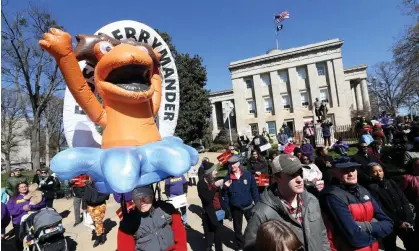  ?? Photograph: Bob Karp/ Zuma Press Wire/Rex/Shuttersto­ck ?? Demonstrat­ors outside the state supreme court in Raleigh, where justices heard oral arguments in Harper v Hall.