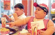  ??  ?? THE MENACE OF OBESITY: This picture is used for representa­tional purposes alone