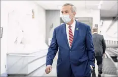  ?? Anna Moneymaker / The New York Times ?? Rep. John Katko, R-N.Y., walks to a vote on the article of impeachmen­t against President Donald Trump at the Capitol in Washington Wednesday. Katko was the only N.Y. GOP member to join Democrats voting for Trump’s impeachmen­t.