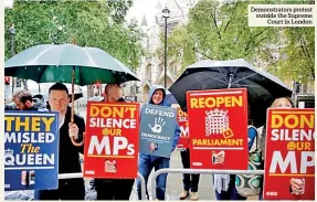  ??  ?? Demonstrat­ors protest outside the Supreme Court in London