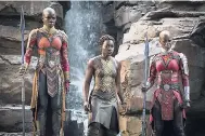  ?? CONTRIBUTE­D ?? This image released by Disney Marvel Studios shows (from left) Danai Gurira, Lupita Nyong’o and Florence Kasumba in a scene from ‘Black Panther’. There is heightened excitement about the showing of the movie in Jamaica.