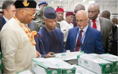  ?? Photo: Akwa Ibom Govt House ?? Vice President Yemi Osinbajo (middle) inspects samples of syringes produced by the Jubilee Syringe Manufactur­ing Company at the official inaugurati­on of the largest syringe factory in Africa t Onna in Akwa Ibom State on Saturday as part of the...