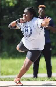  ?? Gregory Vasil / For Hearst Connecticu­t Media ?? Hillhouse’s Leah Moore wins the shot put at the State Open on June 10 at Willow Brook Park in New Britain.