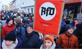  ?? Photograph: Wolfgang Rattay/Reuters ?? A placard reads ‘deport AfD now’, during protests against racism and proposals of Germany’s AfD party to deport foreigners.