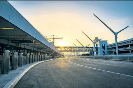  ?? Photograph­s by AJ Bleyer ?? LAX:
The airport is usually teeming with life: Planes overhead, people, cars and shuttles on the ground. But not during this pandemic.