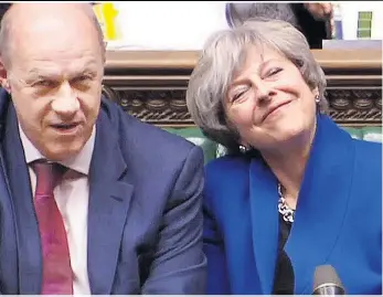  ??  ?? CLOSE FRIENDS Theresa May with key ally Damian Green in the House of Commons yesterday