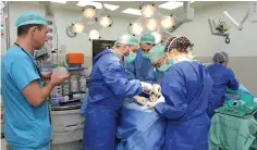  ?? (Piotr Flitr/Rambam Medical Center) ?? SURGEONS at Haifa’s Rambam Medical Center perform an extremely rare operation last week on a baby who was born with his jaws fused shut.