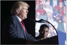  ?? BEN GRAY — THE ASSOCIATED PRESS ?? Former President Donald Trump speaks as Georgia Senate candidate Herschel Walker listens during his Save America rally in Perry, Ga., on Saturday.