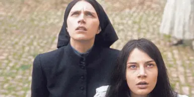  ?? PROVIDED BY 20TH CENTURY STUDIOS ?? Margaret (Nell Tiger Free, left) becomes protective of the troubled orphan Carlita (Nicole Sorace) in the horror prequel “The First Omen.”