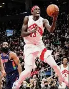  ?? Nathan Denette / Associated Press ?? Toronto forward Pascal Siakam goes to the basket against Philadelph­ia on Saturday. He had 34 points in the victory.