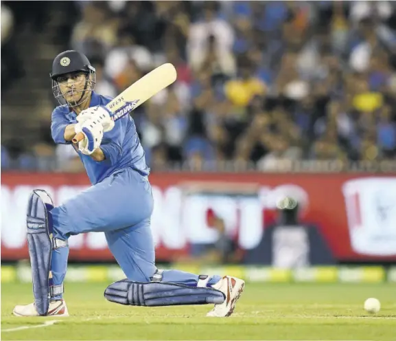  ?? (Photo: AFP) ?? India batsman Mahendra Singh Dhoni plays a shot during the third One-day Internatio­nal match against Australia at the Melbourne Cricket Ground in Melbourne, yesterday.