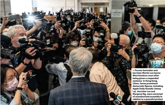  ?? Anthony Kwan ?? > Former lawmaker and barrister Martin Lee leaves West Kowloon court after being given a suspended sentence in Hong Kong, China. Seven prominent democratic figures, including Apple Daily founder Jimmy Lai, barrister Lee and Margaret Ng, were convicted of unauthoriz­ed assembly in relation to a peaceful protest