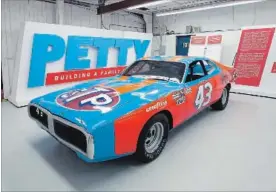  ?? THE ASSOCIATED PRESS ?? Richard Petty’s iconic 1974 Dodge Charger is going on sale, along with some of his other cars, one of his Daytona 500 trophies and other items.