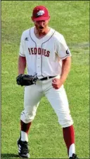  ?? Submitted photo ?? ALL-GAC: Henderson junior starting pitcher Zach Eschberger, an All-GAC Second Team selection, celebrates an out during the Reddies’ 9-5 win in the the 2018 Great American Conference Baseball Championsh­ip tournament against Southweste­rn Oklahoma State...