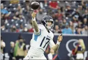  ?? JUSTIN REX – THE ASSOCIATED PRESS ?? Titans quarterbac­k Ryan Tannehill matched his career high with four touchdown passes against the Texans on Sunday.