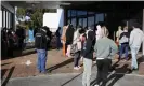  ?? Photograph: Darren Pateman/AAP ?? Newcastle residents queue for testing at the Mater hospital on Thursday.