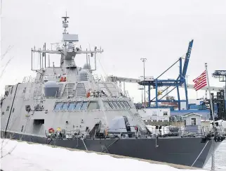  ?? GRAHAM HUGHES/THE CANADIAN PRESS/FILES ?? The USS Little Rock, shown moored in Montreal’s Old Port in January, is finally on its way back to its home port in Florida, the U.S. Navy confirmed on Saturday.