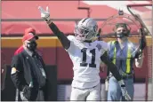  ?? JEFF ROBERSON — THE ASSOCIATED PRESS ?? Raiders wide receiver Henry Ruggs III celebrates a first down after catching a pass during the first half against the Chiefs on Sunday in Kansas City.