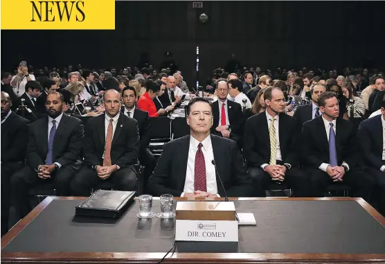  ?? CHIP SOMODEVILL­A / GETTY IMAGES ?? Former FBI director James Comey testifies before the Senate Intelligen­ce Committee Thursday, where he said President Trump demanded Comey’s loyalty in a private meeting.