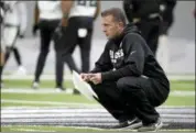  ?? DAVID MAIALETTI — THE PHILADELPH­IA INQUIRER VIA AP ?? Philadelph­ia Eagles quarterbac­ks coach John DeFilippo watches the team practice last month. The Minnesota Vikings hired DeFilippo as their offensive coordinato­r on Friday.