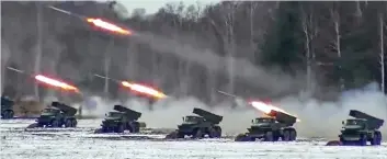  ?? ?? Show of strength: Russian rocket launchers at a firing range in Belarus