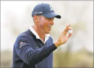  ?? Matt York / Associated Press ?? Matt Kuchar drew criticism after winning the Mayakoba Classic in Mexico and paying his fill-in caddie just $5,000 of his $1.3 million purse.