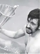  ?? ?? 0 John Greig in the bath with the cup