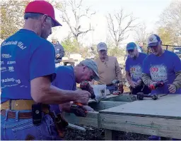  ?? Staff photo by Neil Abeles ?? ■ There’s one certainty with a ramp project — each movement gets plenty of inspection. Pictured from left are Brad Heath, Charles Snowden, Phil Huffer, Pete Schroeder and David Culpepper.