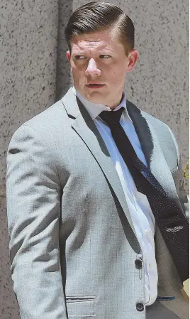  ?? STAFF PHOTO BY MATT WEST ?? ‘I’M SORRY’: Benjamin Urbelis leaves Suffolk Superior Court yesterday after being found not guilty on charges of negligent operation of a boat and operating a boat while under the influence. The defense attorney must stay clean for a year and attend...